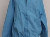 the jacket is blue and has a hood that is attached to it