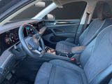 the interior of a car with a steering wheel and a dashboard