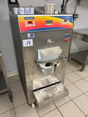 an image of a commercial ice cream machine in a commercial kitchen