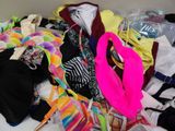 a pile of clothing that is sitting on a table