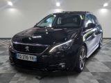 a picture of a black car parked in a garage