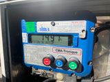an image of a meter that is on the side of a building