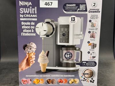 packaging of a coffee maker with a scoop of ice cream in front of it
