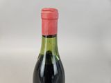 a bottle of wine that is sitting on a table