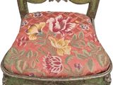 an image of a chair with a floral upholstered seat