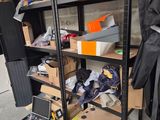many boxes and boxes on the shelves in the garage