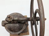an old machine that is on display on the wall