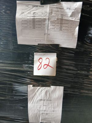 three pieces of paper that have been wrapped in plastic