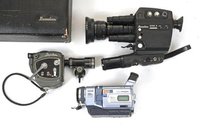 a camera, a video camera, and a case on a table