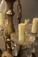 Lustre à douze bras de lumière en métal doré et pampilles en… (photo 5)