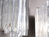a wall light that is hanging from the ceiling