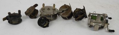 a lot of different types of motor parts on the table