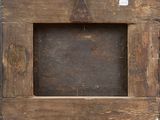 a picture of a wooden frame hanging on a wall