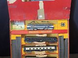 a box with a train set inside of it