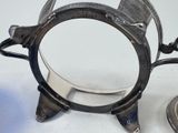 a small metal object with a magnifying glass on it