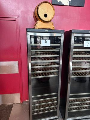 two wine coolers that are sitting next to each other