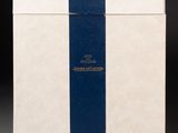 a white and blue box with a blue ribbon on it