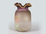a glass vase with a purple and gold design on it