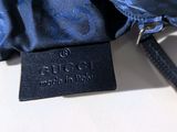an image of a close up of a bag with a tag on it