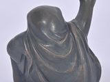a statue of a woman with a veil on her head