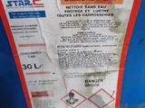 a sticker on the side of a blue container