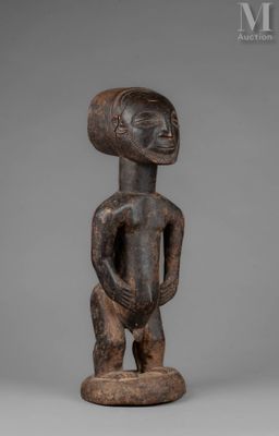 a wooden statue of a man with a head and hands on his chest