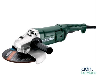 a close up of a small angle grinder on a white background