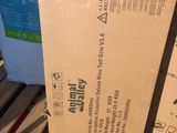 a cardboard box sitting on the ground next to a pallet