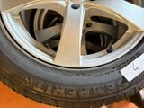 a close up of a tire on a stand