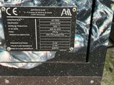 a close up of a microwave oven on a stone surface