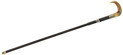 Canne fusil à système. Canon en fer et poignée en corne.