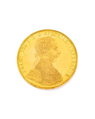 l'image d'une pièce d'or sur laquelle figure le visage d'une femme