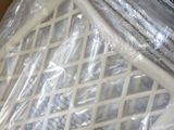 a plastic basket that has been wrapped in plastic