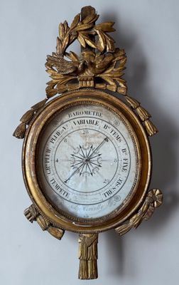 a clock that is hanging on the wall