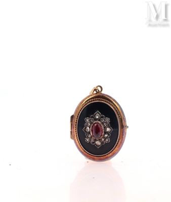 an image of a picture of a ring with a red stone in it