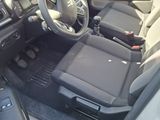 the interior of a car with a steering wheel and a dash board