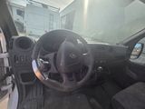 a car with a steering wheel and a dash board