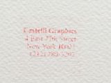 a close up of a piece of paper with red writing on it