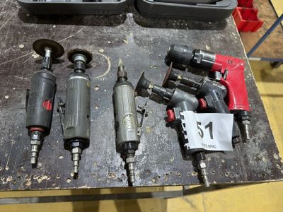 a lot of tools that are sitting on a table