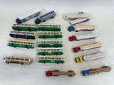 many different types of toy trains and trucks on the table
