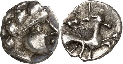 a silver coin with an image of a man on it