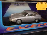 a toy car in a box with a price tag on it