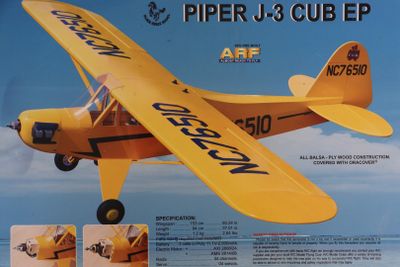 a picture of a model of a yellow airplane