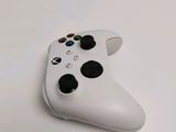 a close up of a game controller on a table