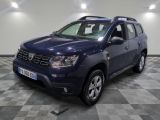 the blue dacia is parked on a checkered tile floor