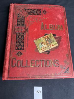 an old red book with a picture of a man and a woman on it