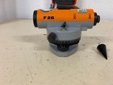 a close up of a surveying device on a table in a room