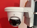 an image of a security camera attached to a pole