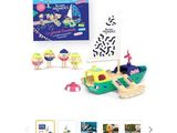 a picture of a toy boat that is on the table