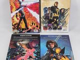 three comics are sitting on top of each other in front of a white background